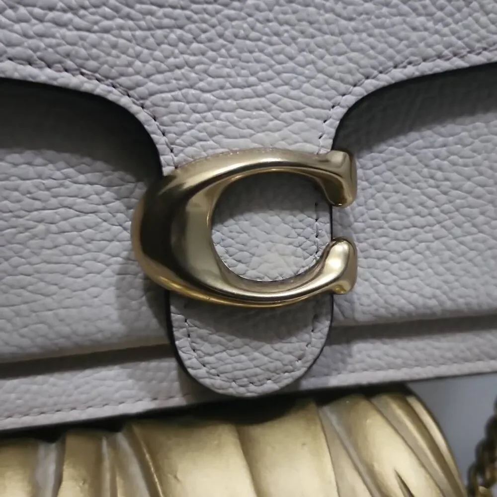 Coach Tabby Mini Chain Clutch in Chalk pebbled leather with gold-tone upgraded c